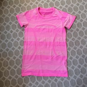 Pink short sleeve lulu lemon top.
